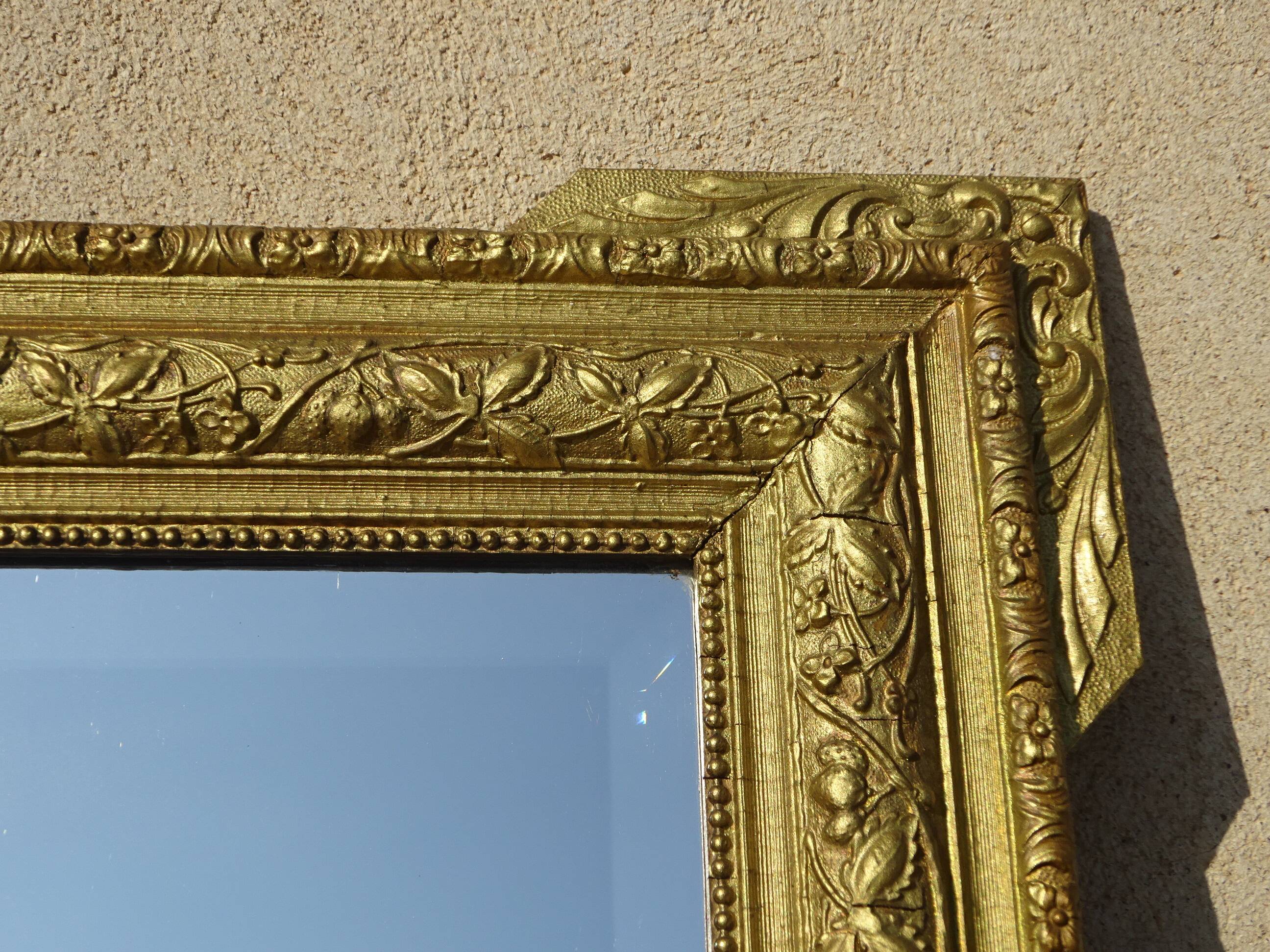 Antique wooden mirror with gilded stucco 65x83cm