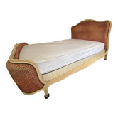 Elegant Louis XV style upholstered bed, patinated wood, house spirit of f