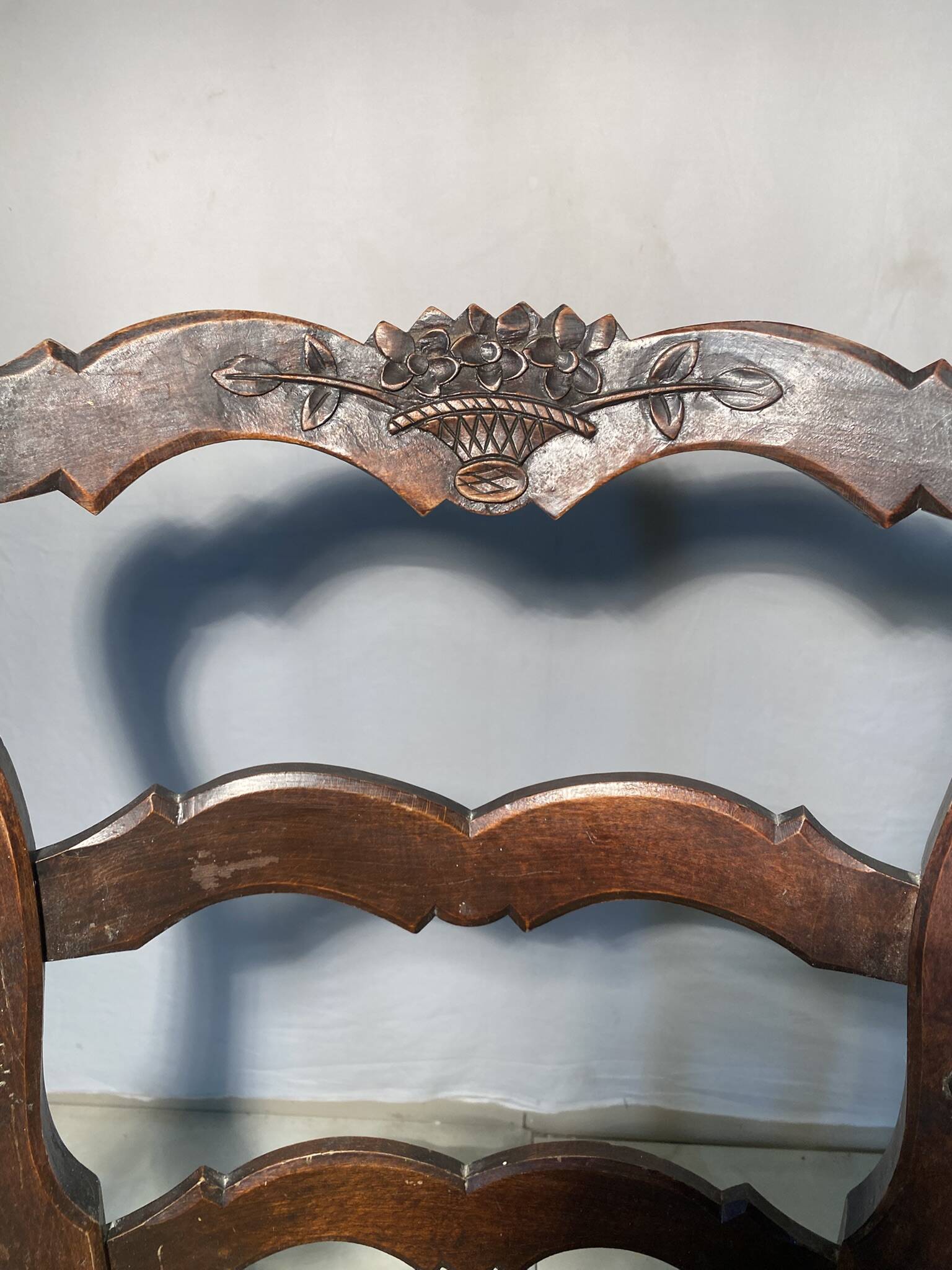 Antique Provencal armchair in carved wood with straw seat