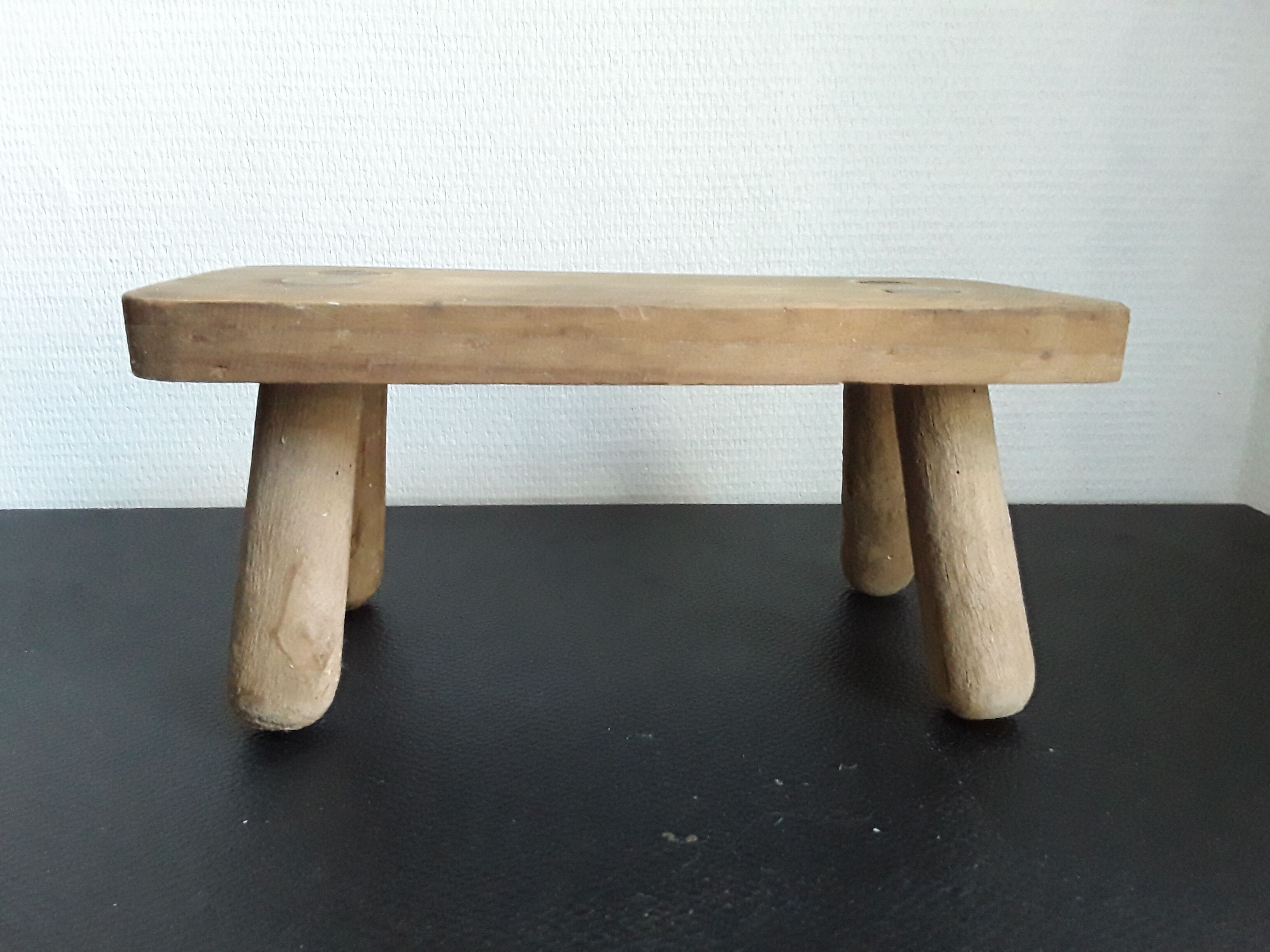 Vintage footstool in light wood