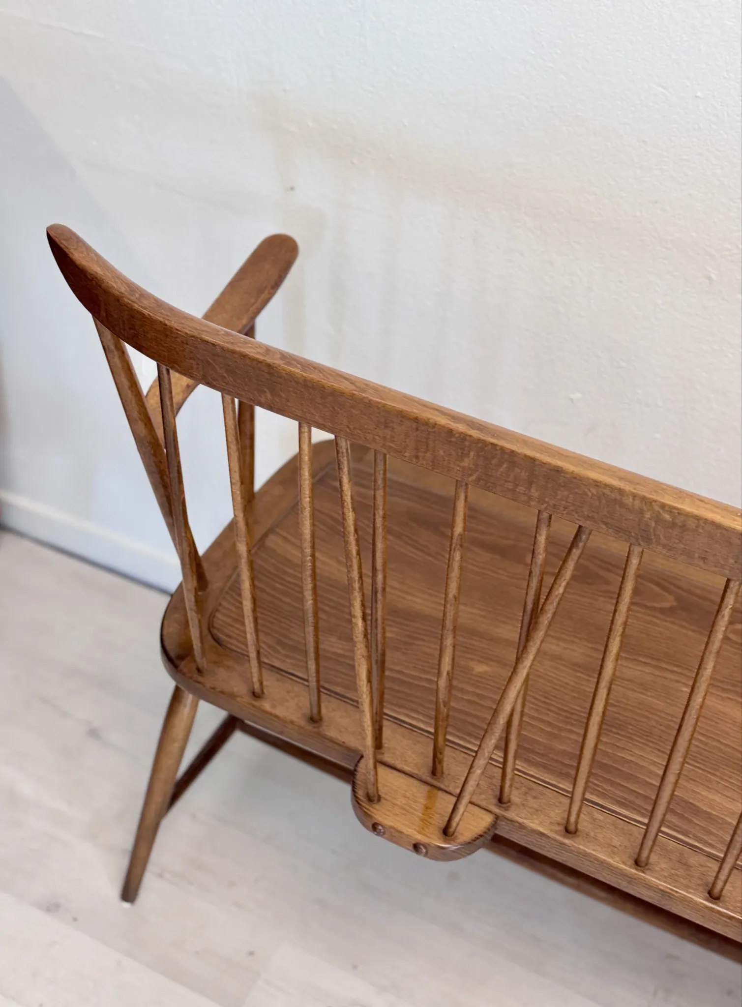 Vintage mid-century slatted bench from the 1960s.