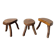 Set of three rustic solid wood tripod stools.