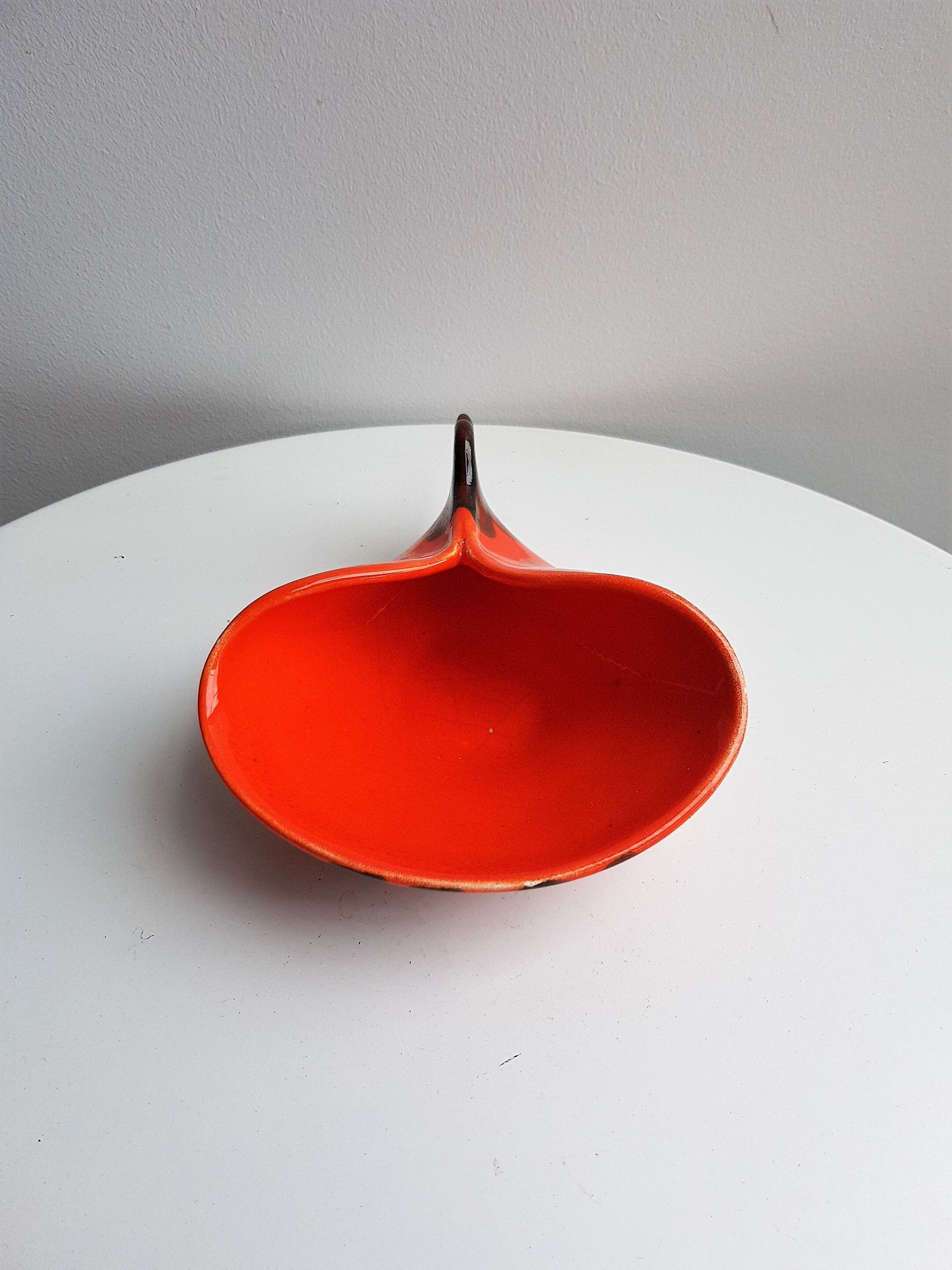 Empty orange enamelled pocket bird years 70