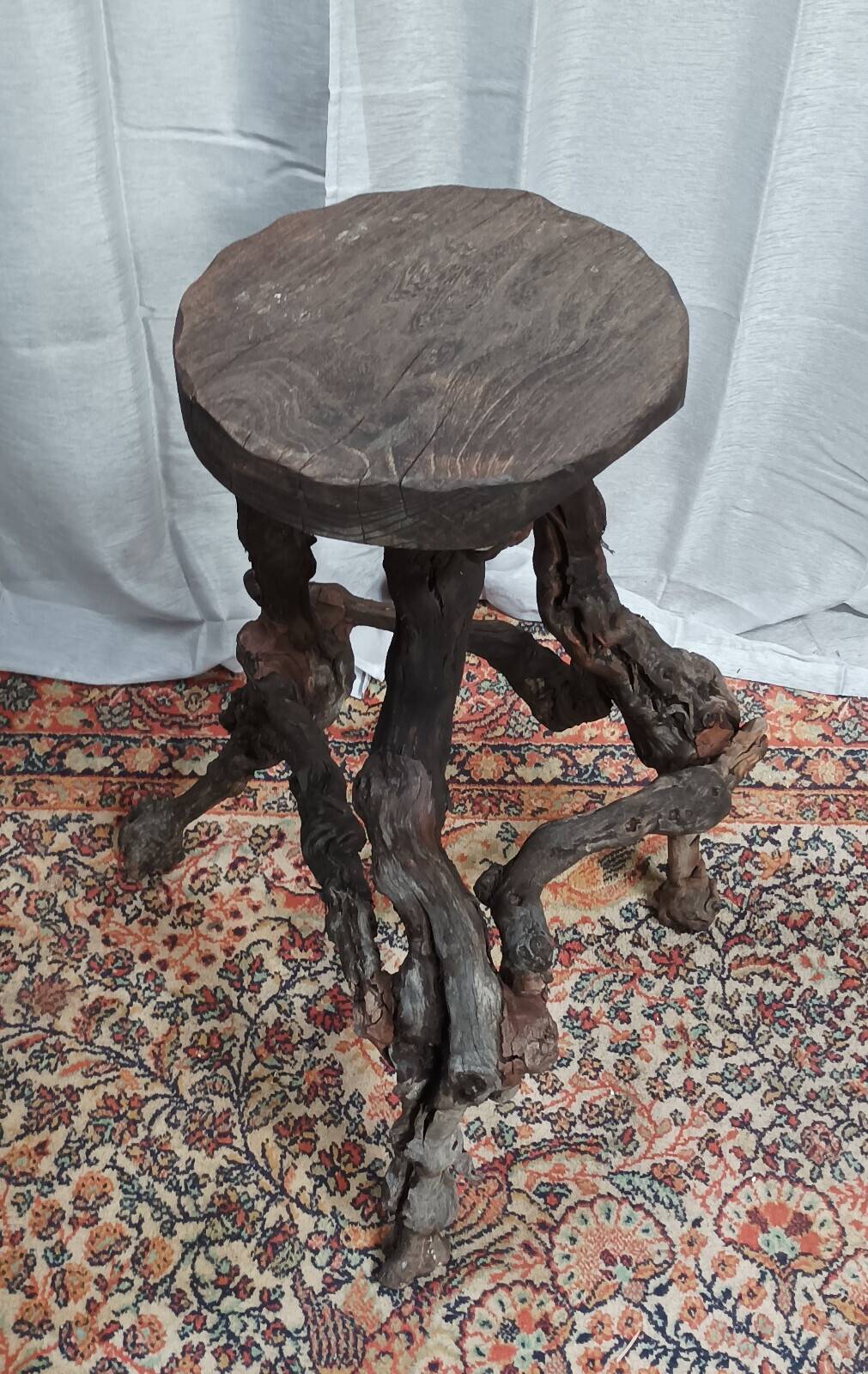 Brutalist bar stool made of vine wood