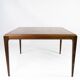 Coffee table in rosewood designed by Johannes Andersen and manufactured by Silkeborg Furniture
