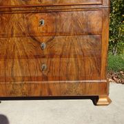 Walnut and walnut burl commode in Louis Philippe style.
