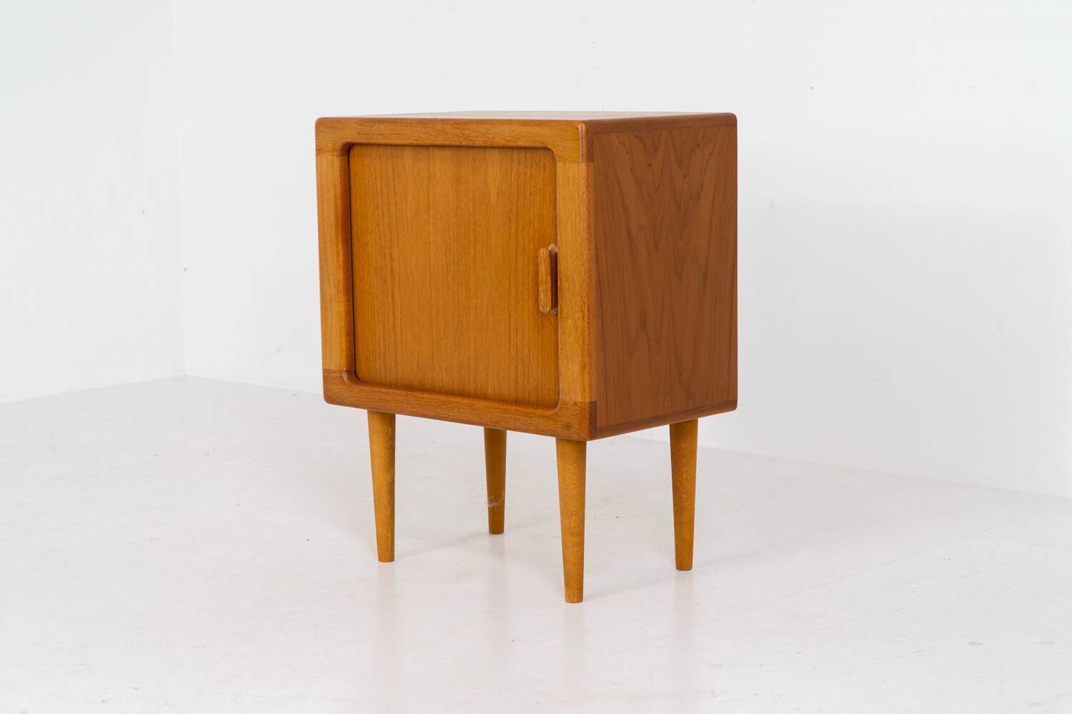 Compact cabinet with tambour door by CFC Silkeborg (Denmark, 1960s).