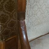 A pair of Empire period armchairs.