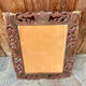 Antique mirror in carved wood