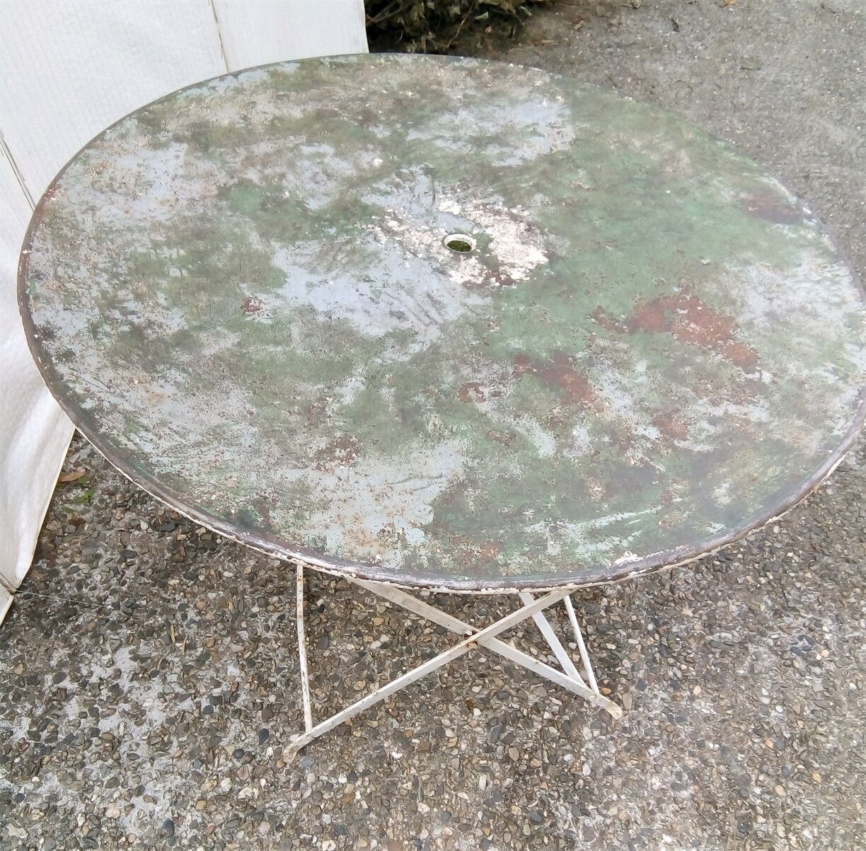 Old folding iron garden table