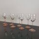 4 Luminarc white wine glasses with pink feet