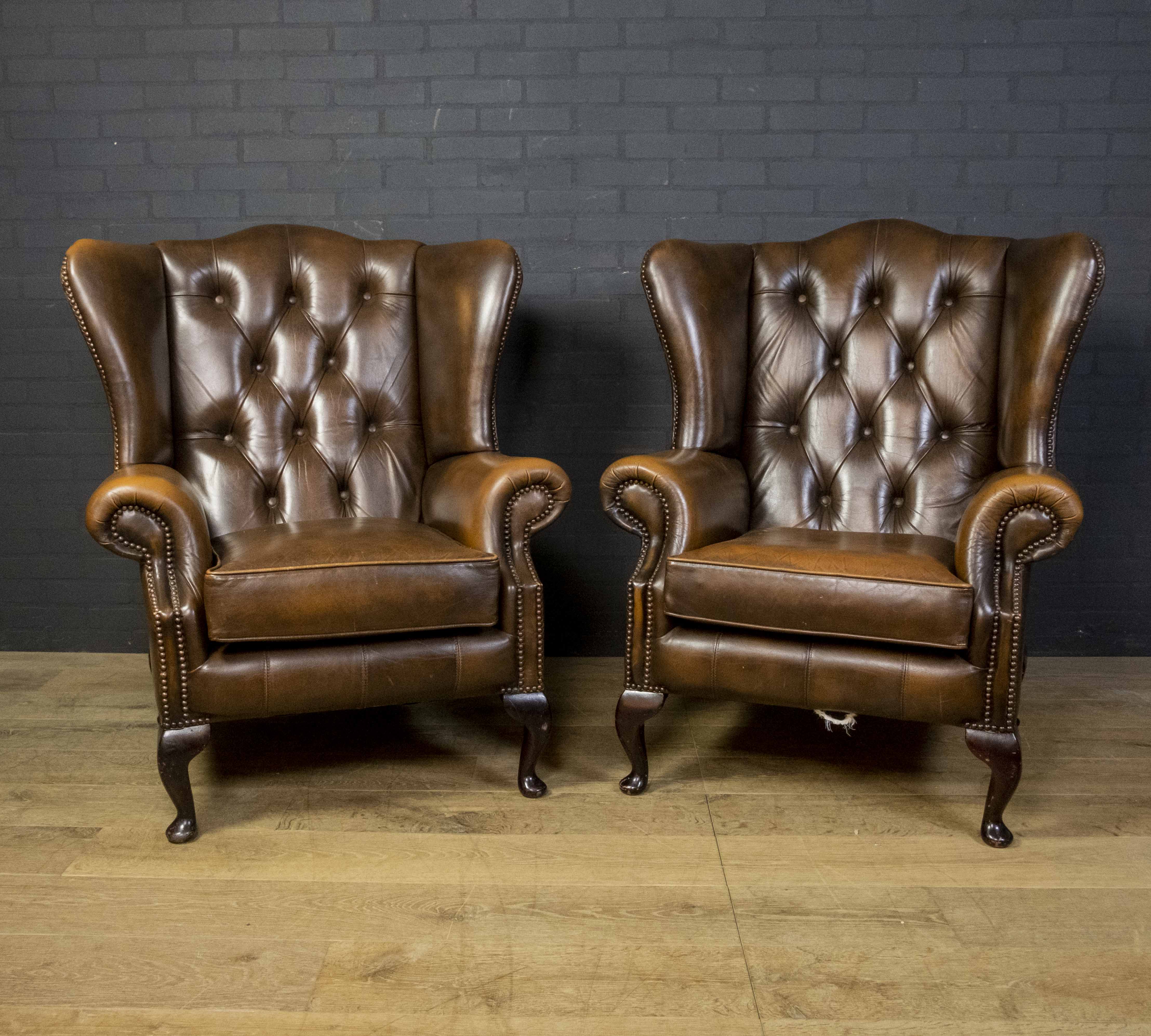 Set of Chesterfield armchairs with footstool