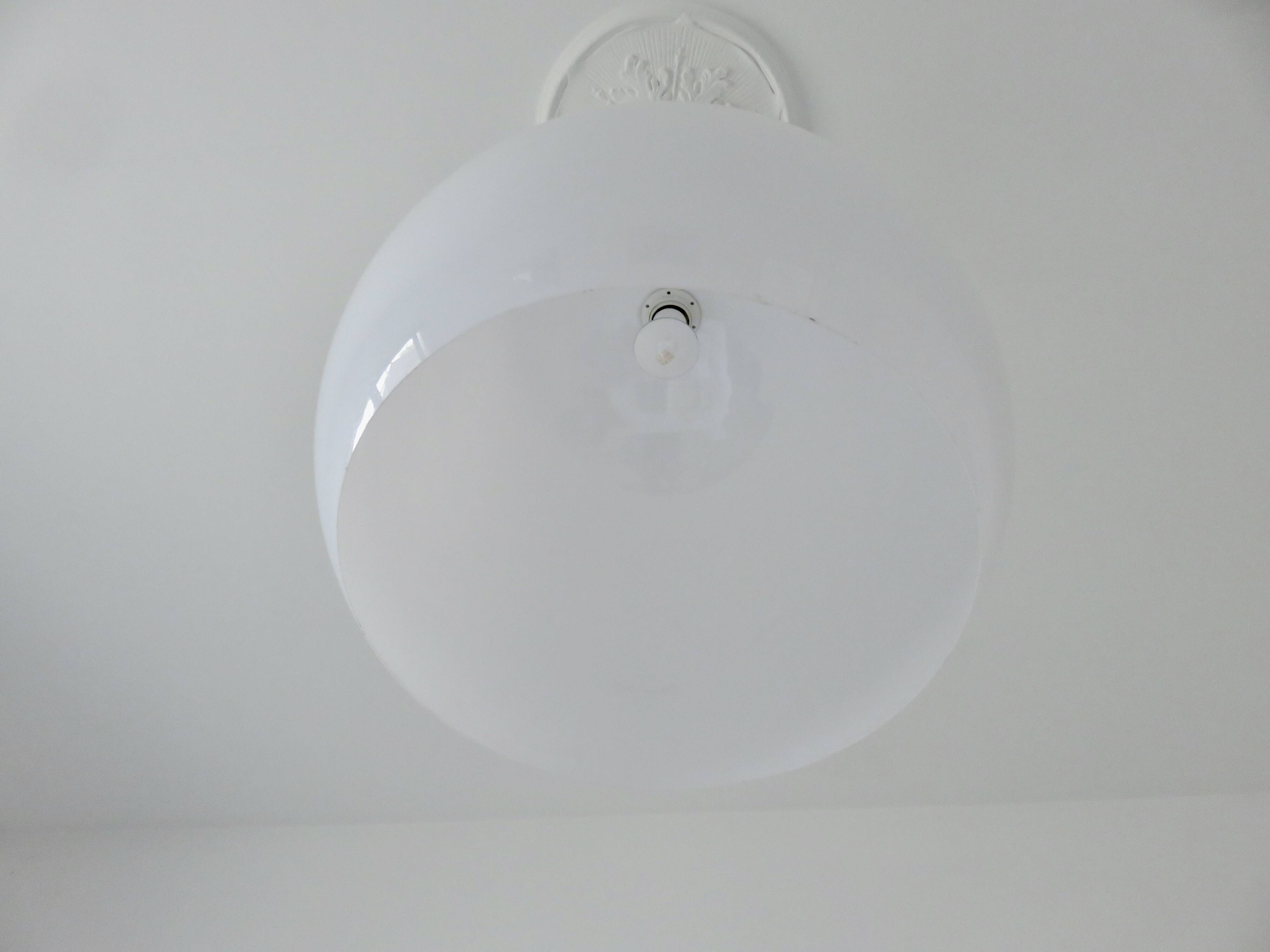 Large spherical suspension in perspex from the 1990s.