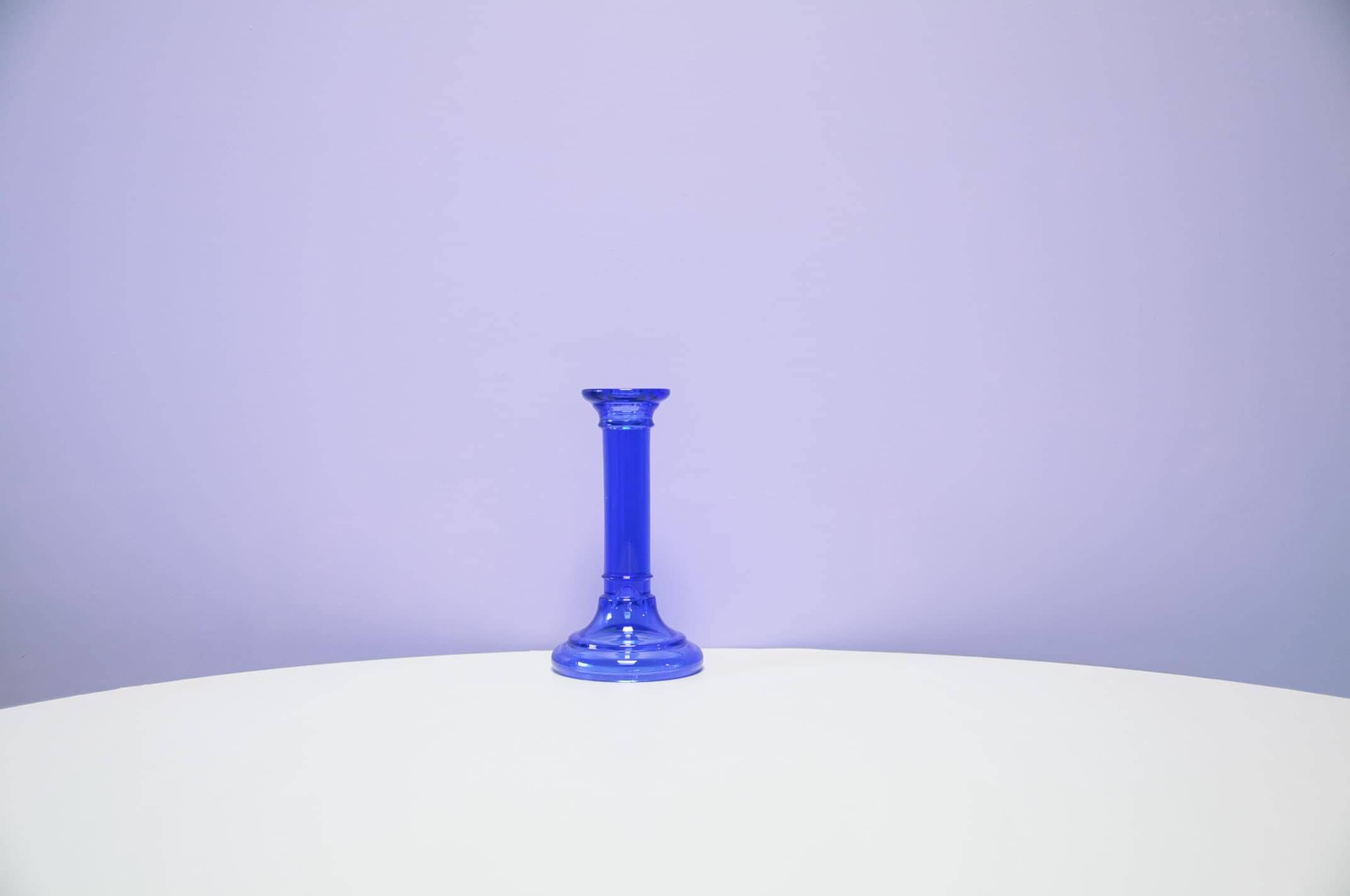 Vintage tall blue glass candlestick