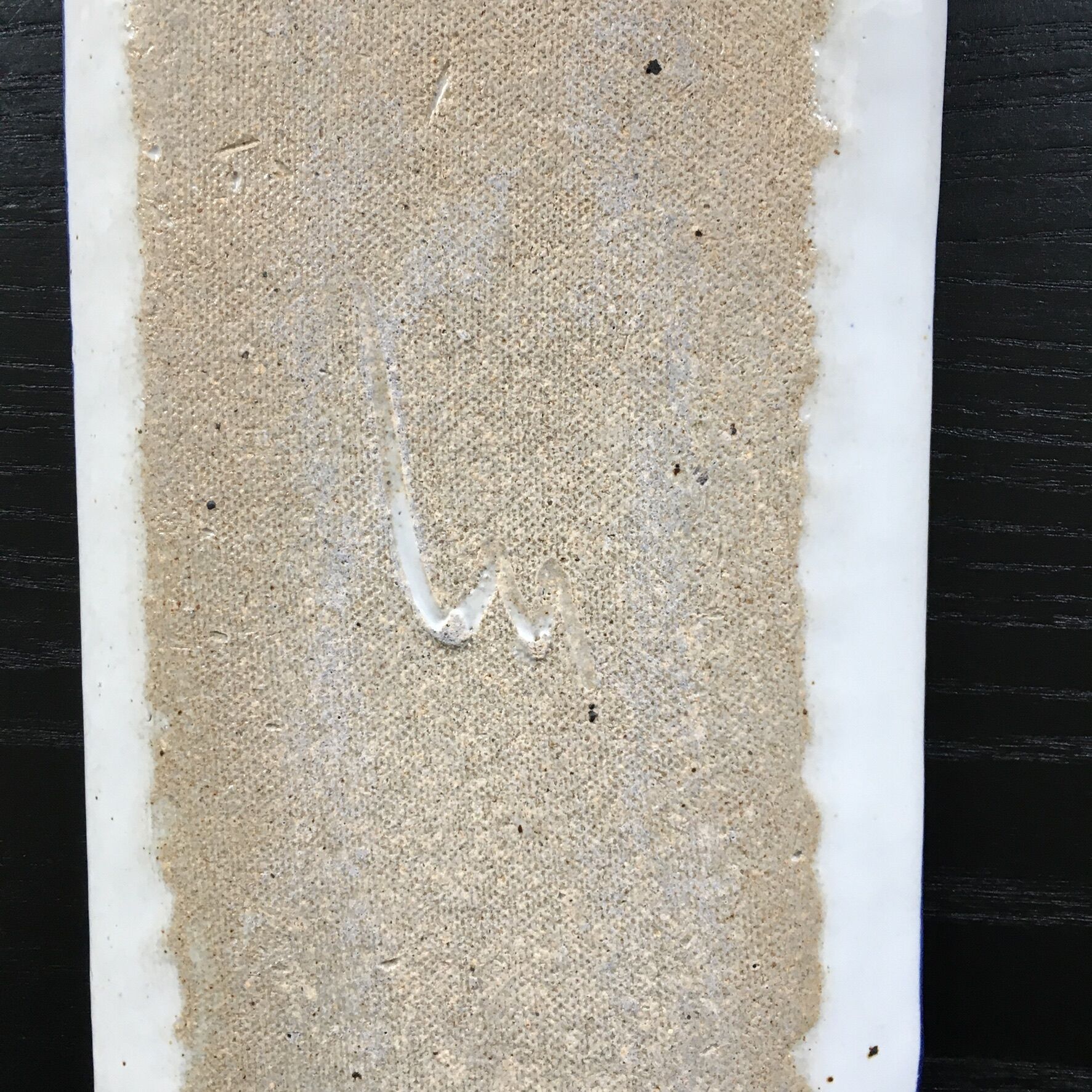 Hortensia-decorated stoneware plate signed