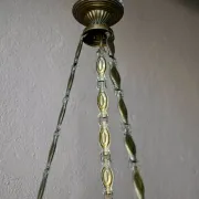 Art Deco lustre in brass and frosted pressed glass from the 1930s.
