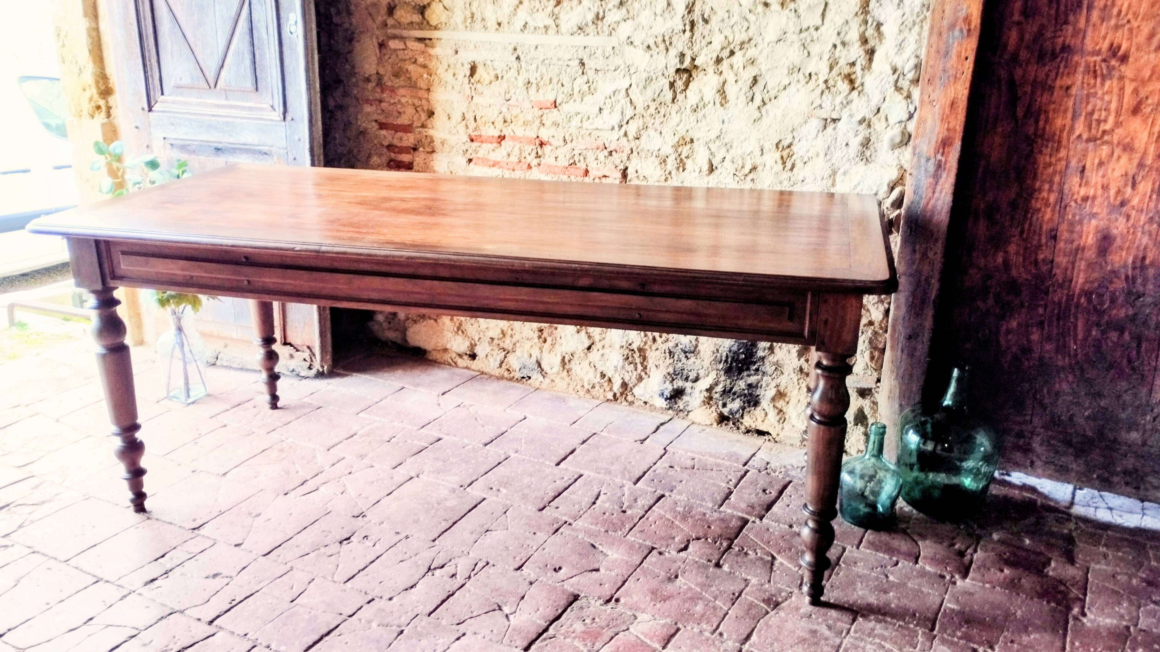 Old French farmhouse table in walnut, turned legs, waxed finish