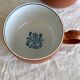 2 very and earthenware coffee cups