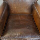 Sheepskin leather armchair with character and a touch of Art Deco design