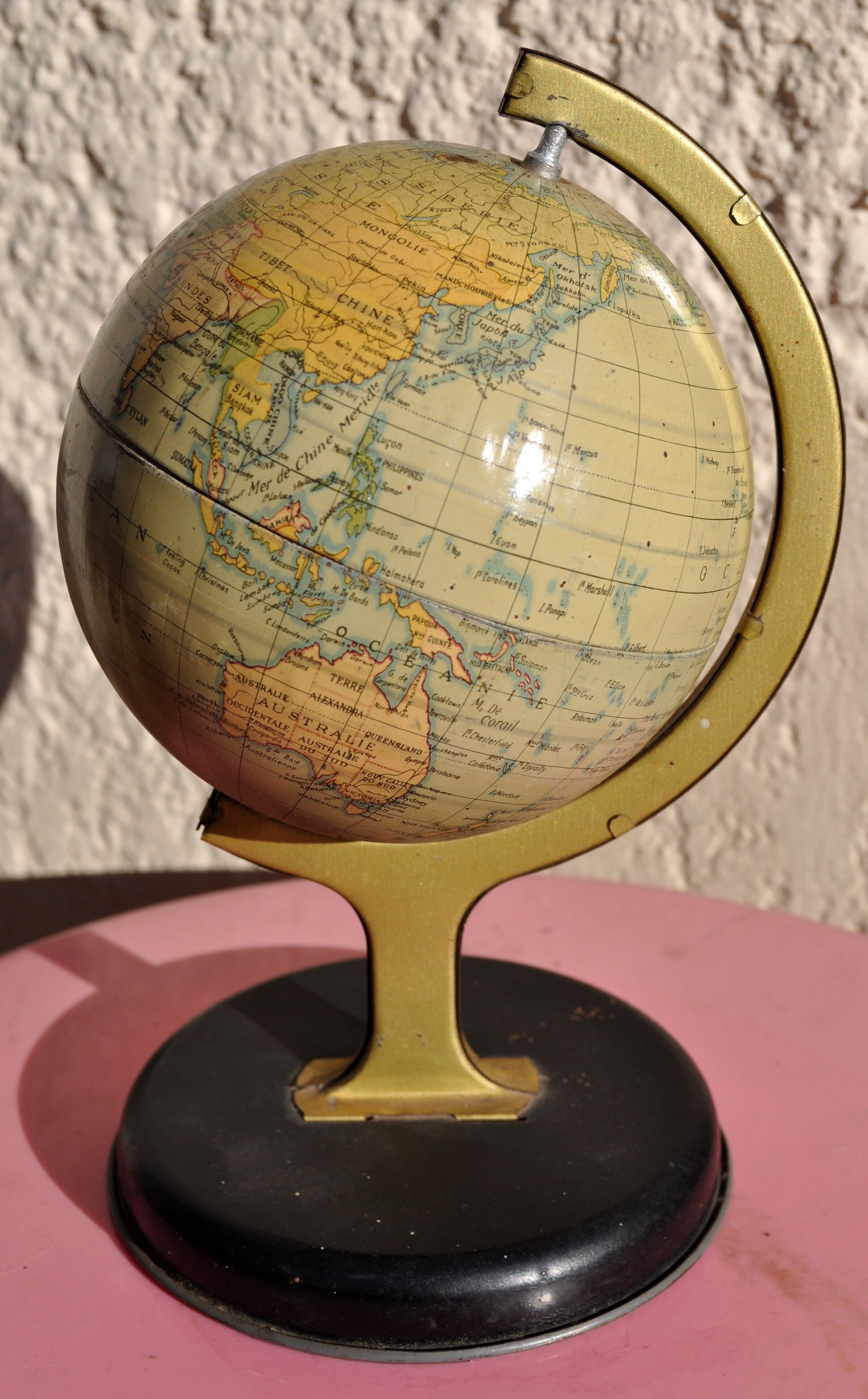 Small vintage metal globe