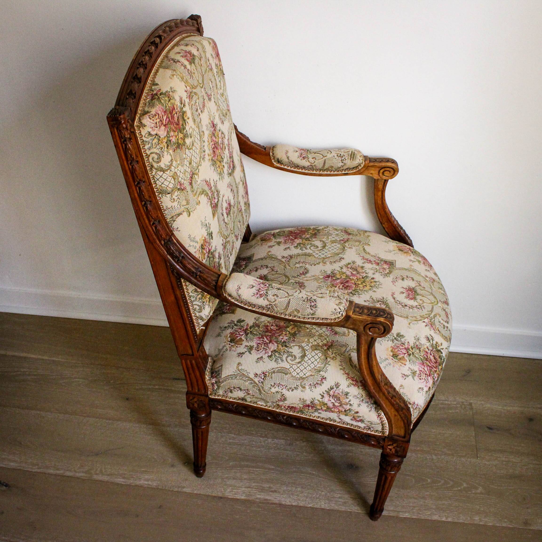 Louis XVI style carved armchair