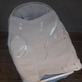 Wicker and painted wood baby cradle