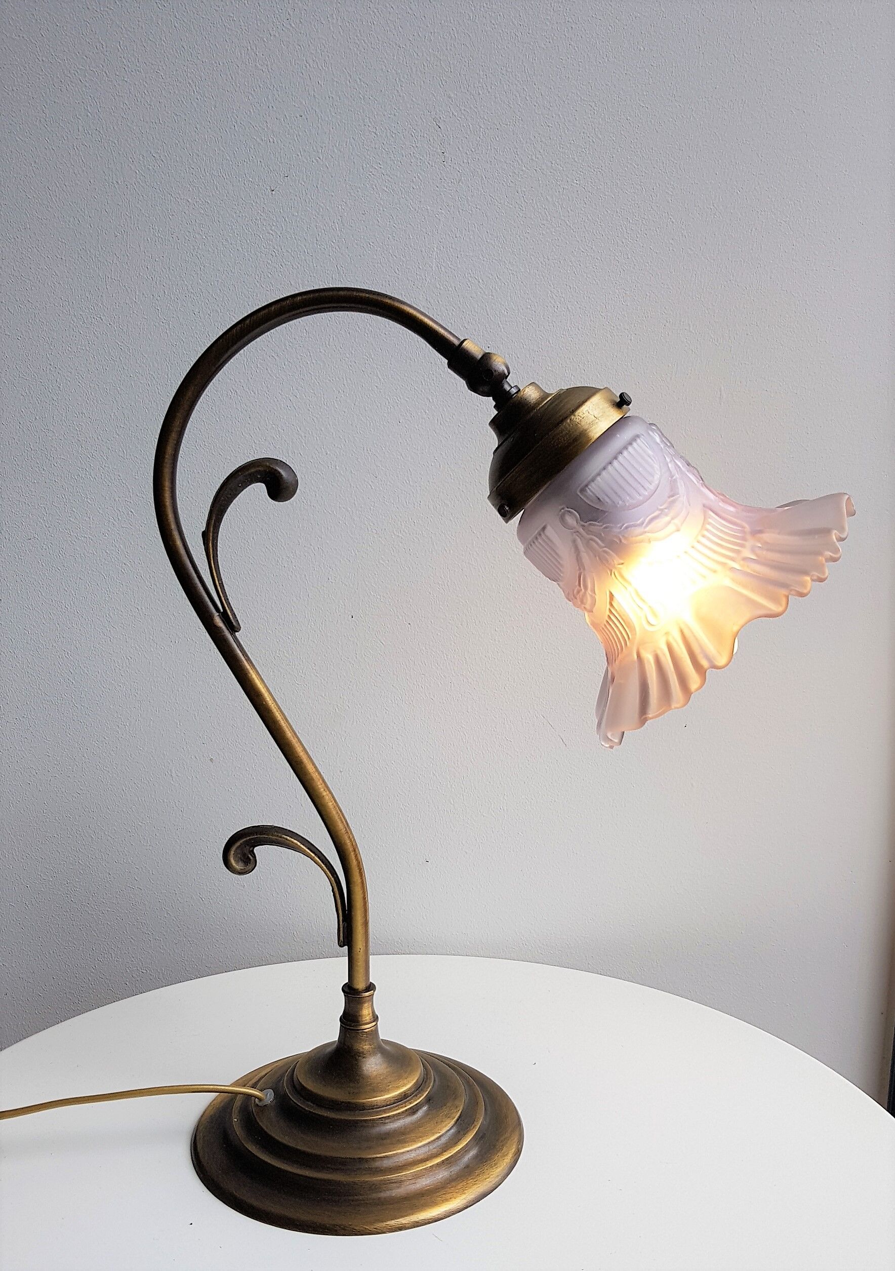 Articulated in brass and frosted glass lamp