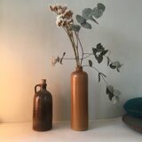 Duo of sandstone bottles