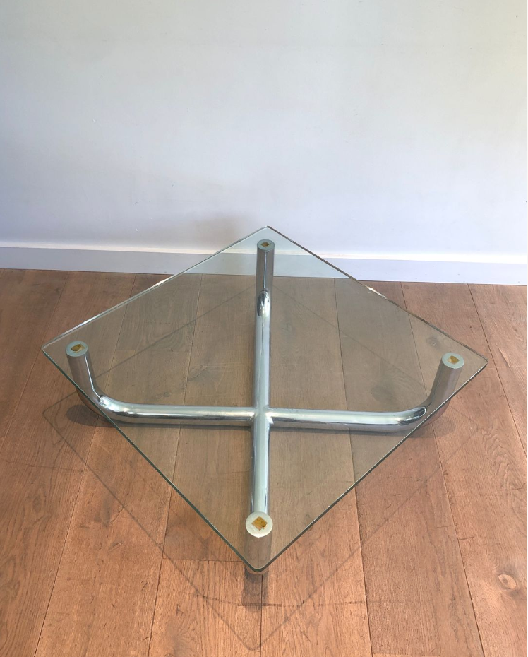 Chrome coffee table with a glass top