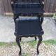 Set of 3 black nesting tables.