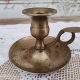 Hand candle holder called cellar rat in solid brass