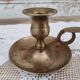 Hand candle holder called cellar rat in solid brass