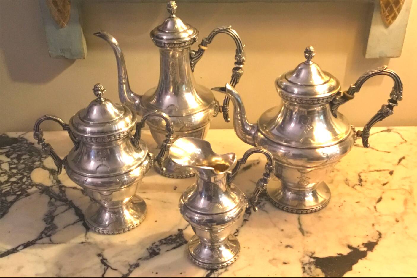 Silver-plated metal tea and coffee service in a 4-piece style.