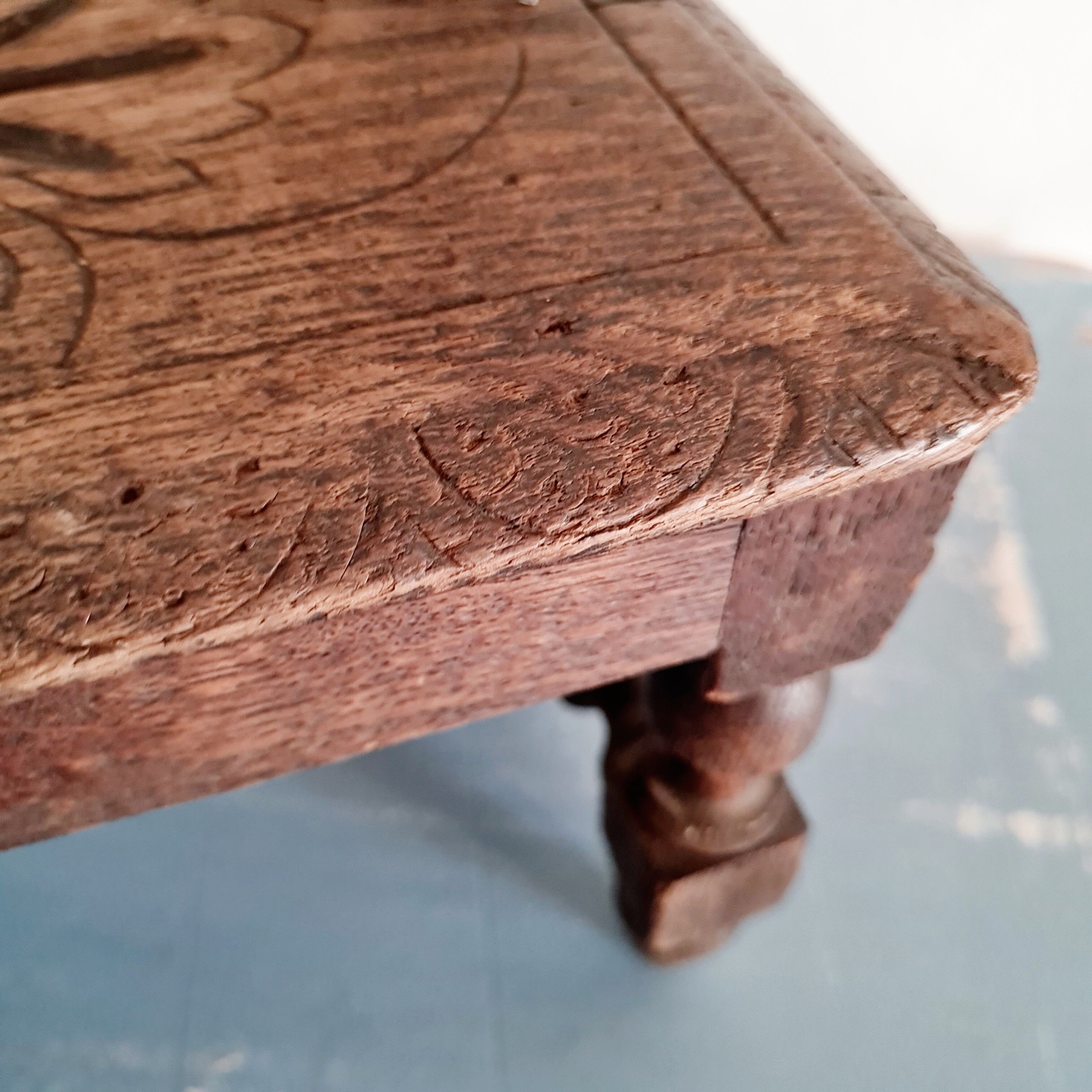 Small old carved wooden bench