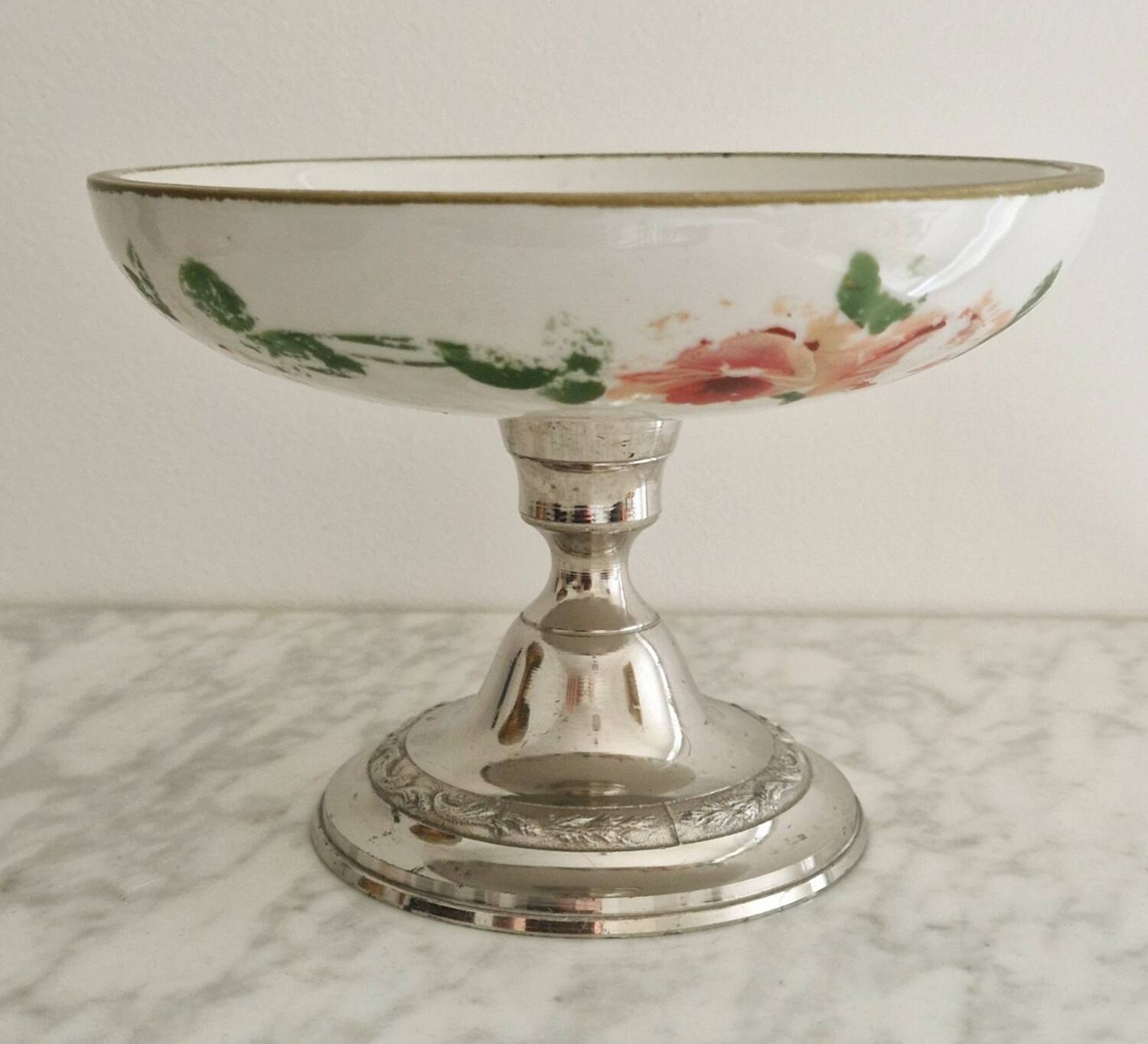 Porcelain cup on silver metal foot