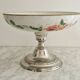 Porcelain cup on silver metal foot