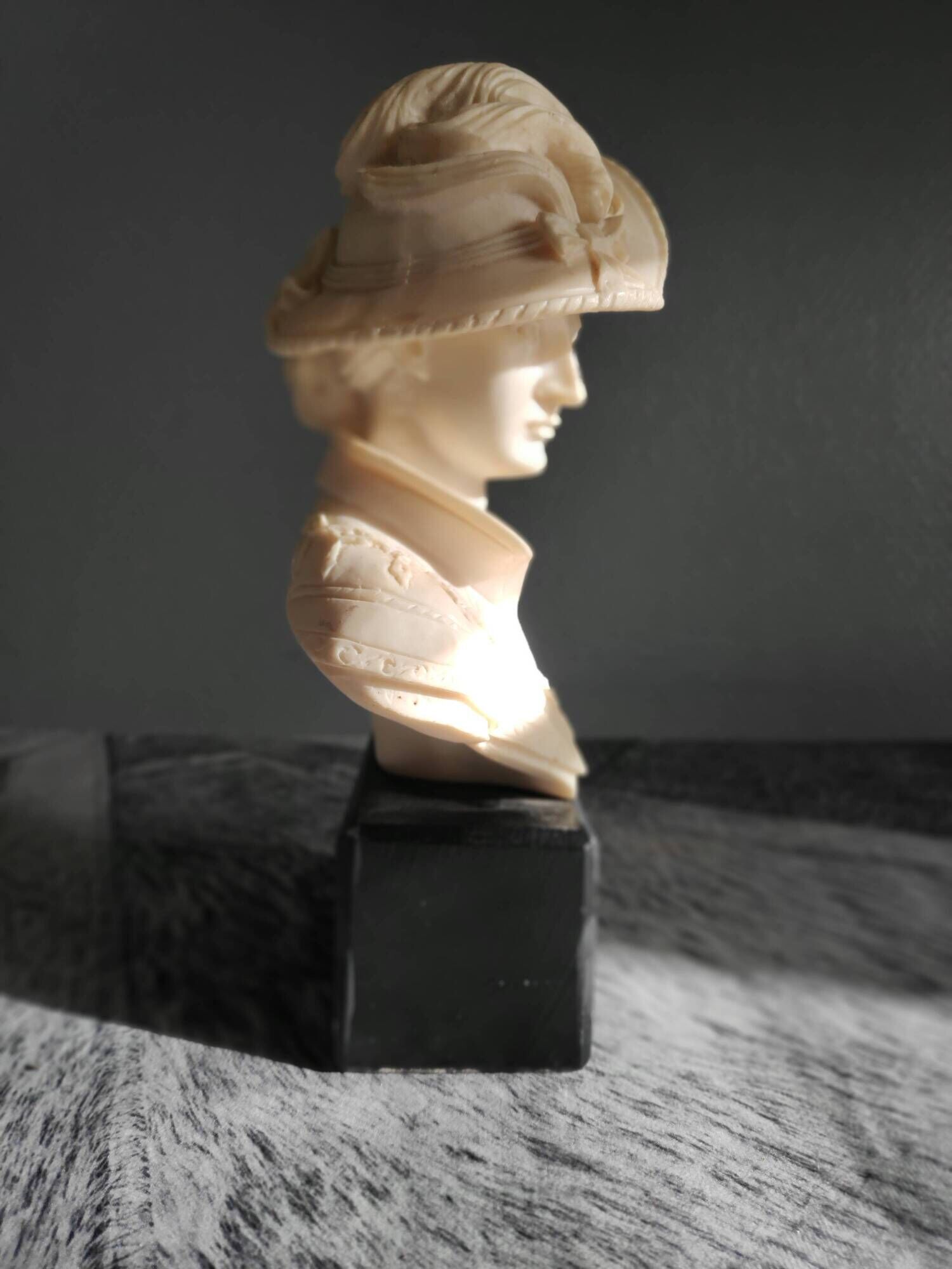 Elegant woman bust with alabaster shawl and black base of the 1950s