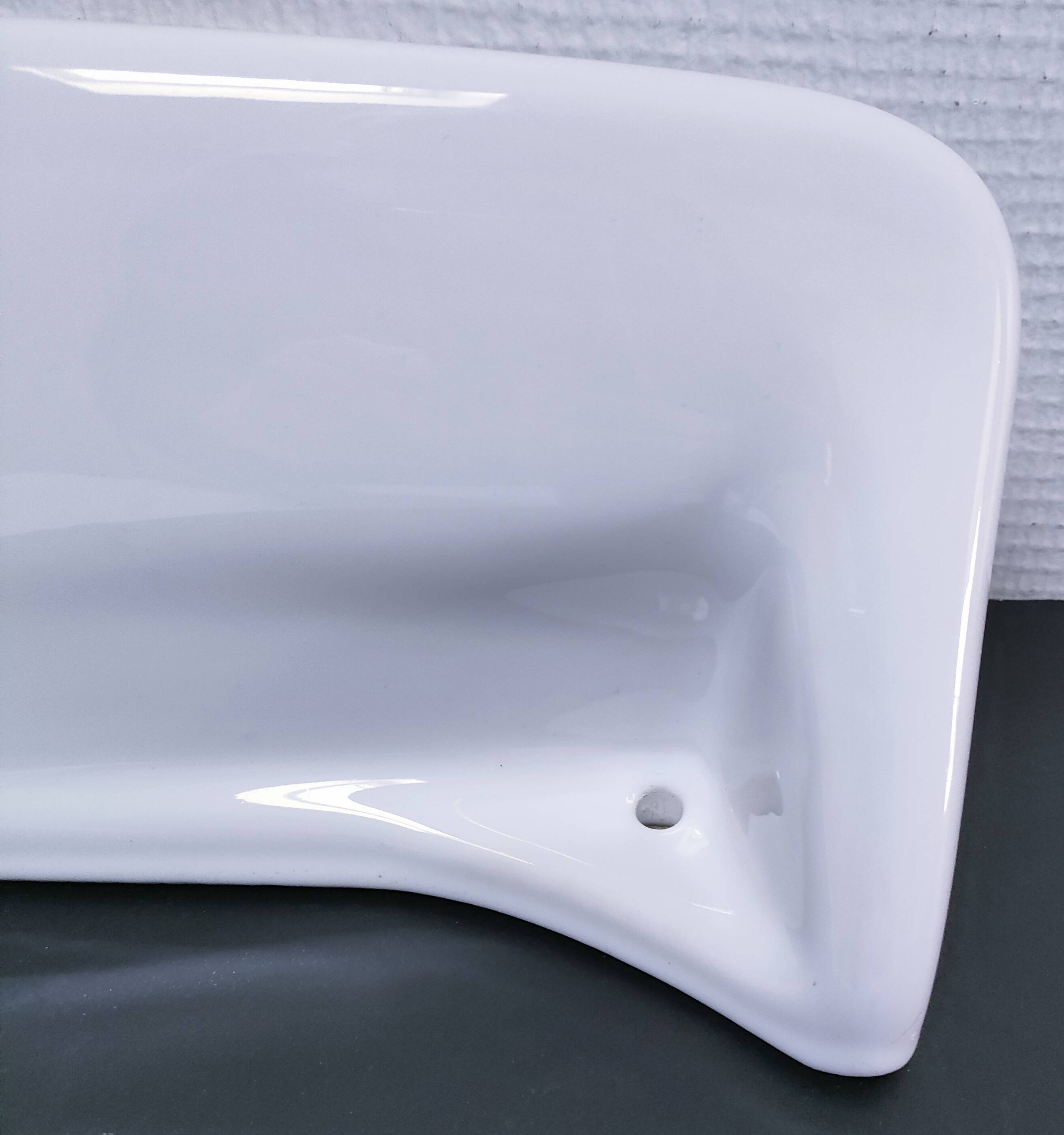white glazed ceramic wall shelf from the 60s