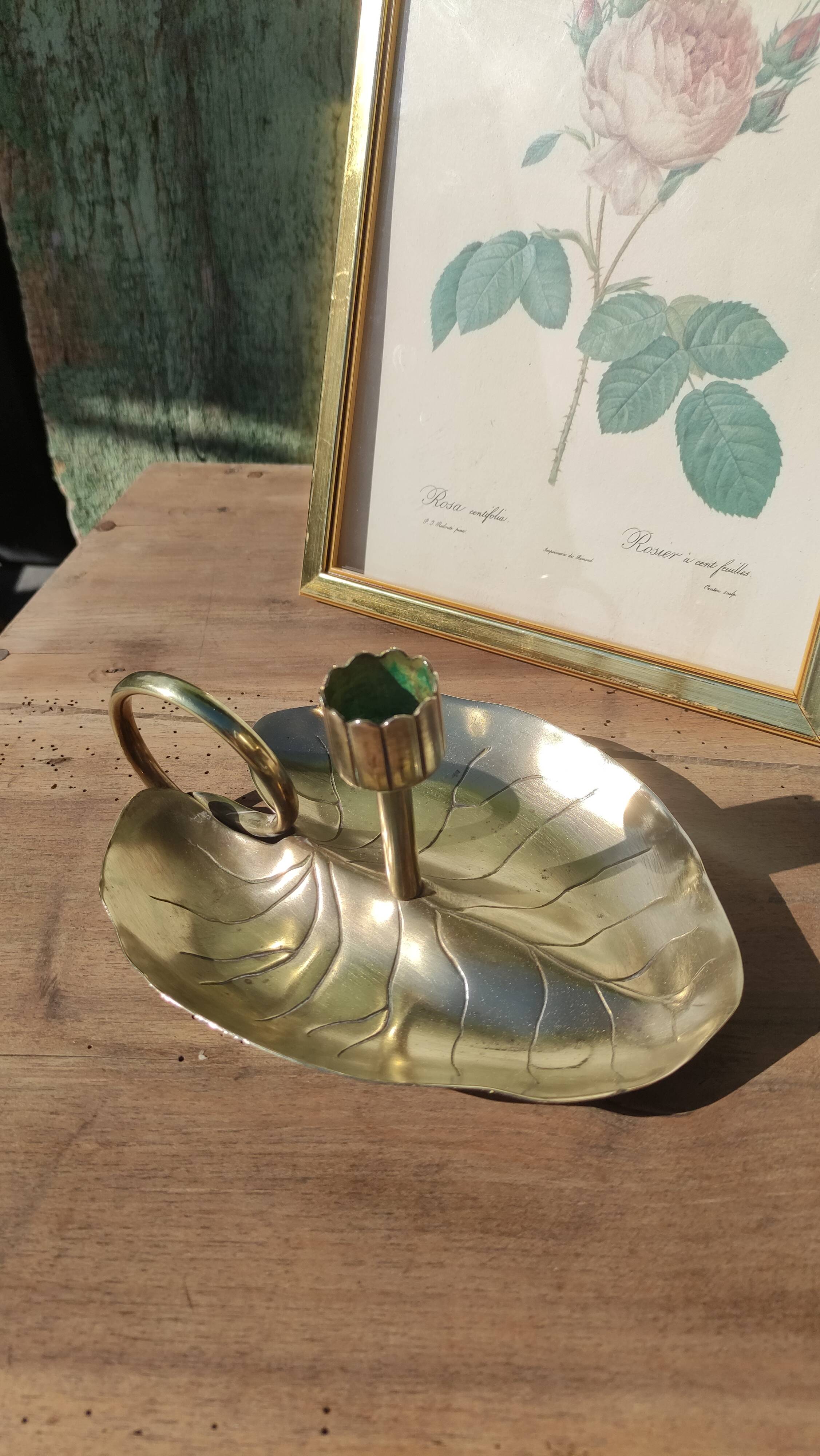 Vintage candle holder in golden brass