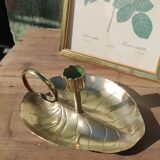 Vintage candle holder in golden brass