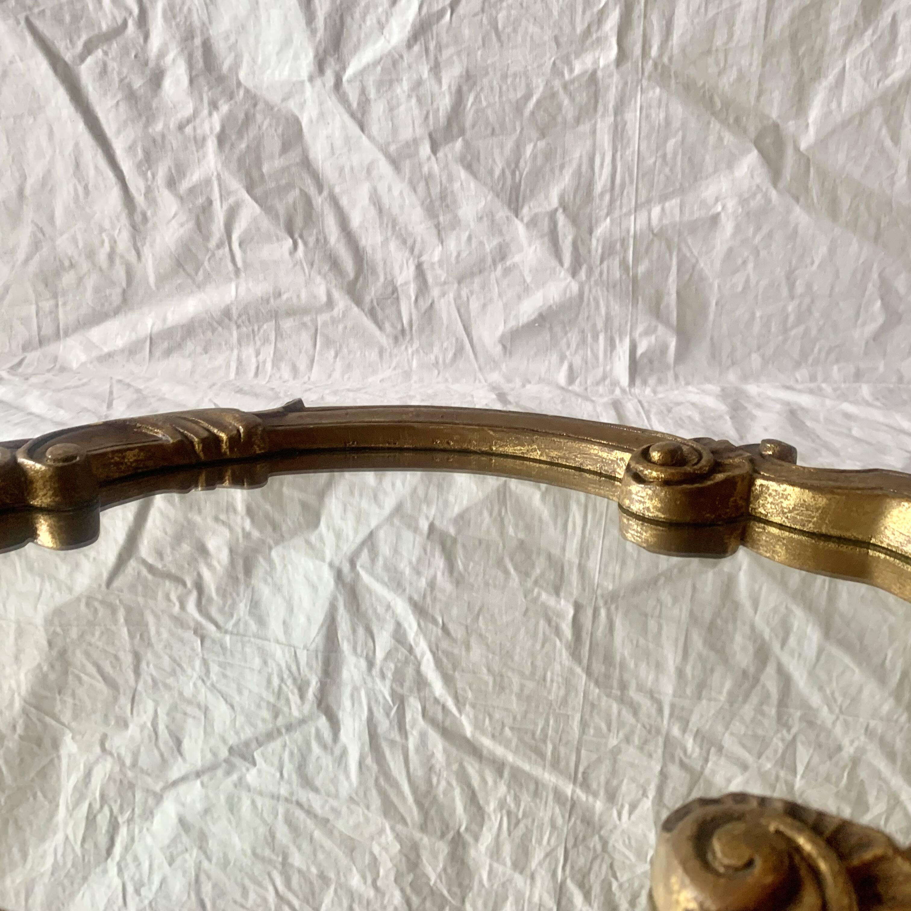 Vintage wall mirror in gold resin