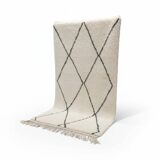 Moroccan Berber rug with black diamond patterns