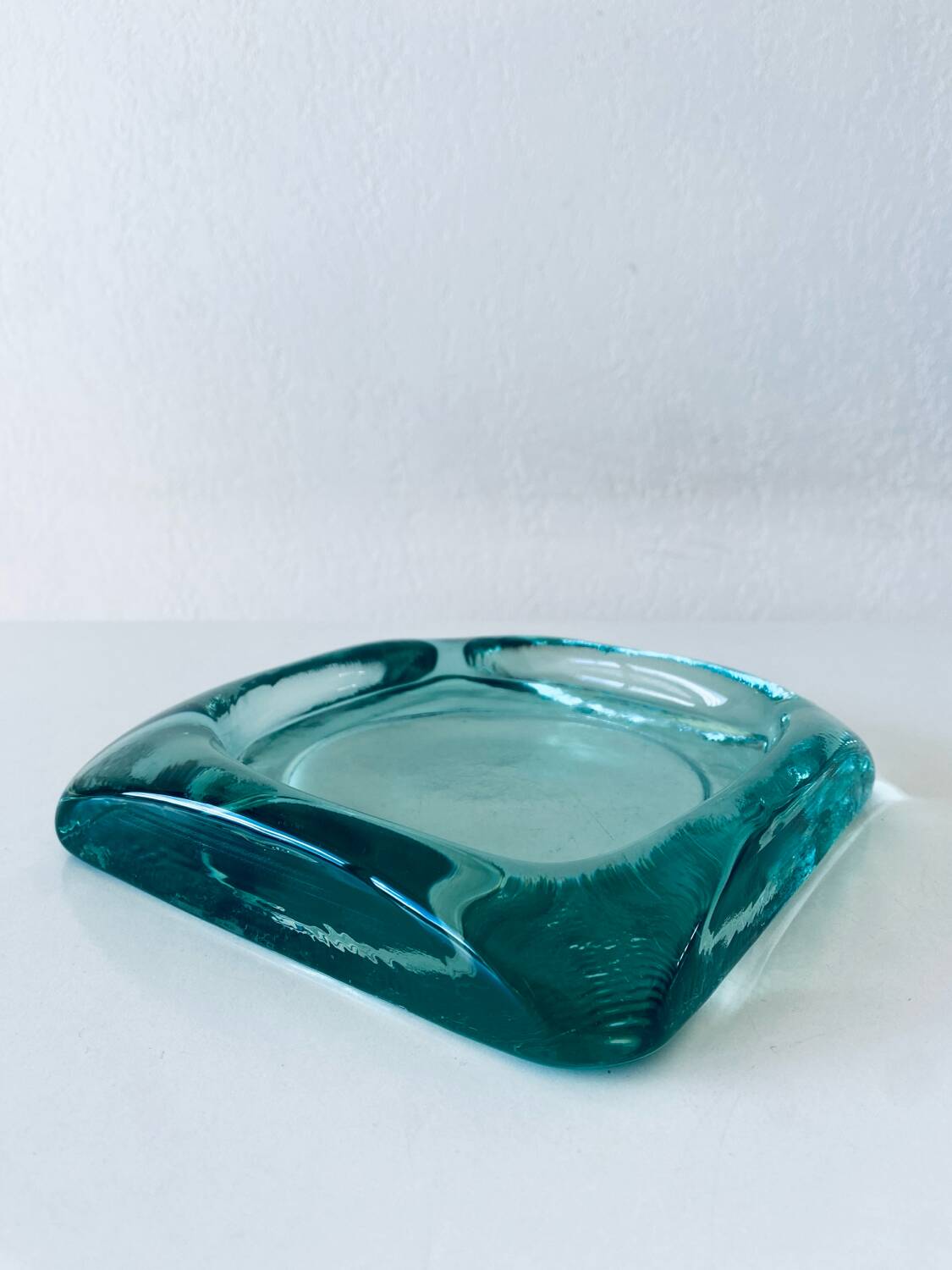 Glass tiled pocket emptier