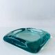 Glass tiled pocket emptier