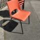 6 orange chairs