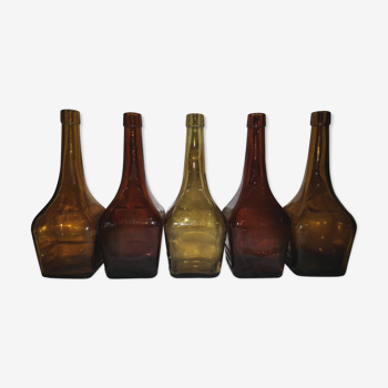 5 old bottles of Marie Brizard liqueur