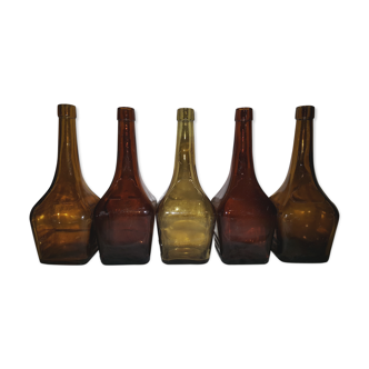 5 old bottles of Marie Brizard liqueur