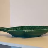 Ceramic serving flat plate in the shape of green fish