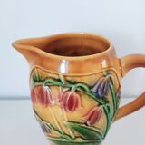Pichet orangé fleurs en relief