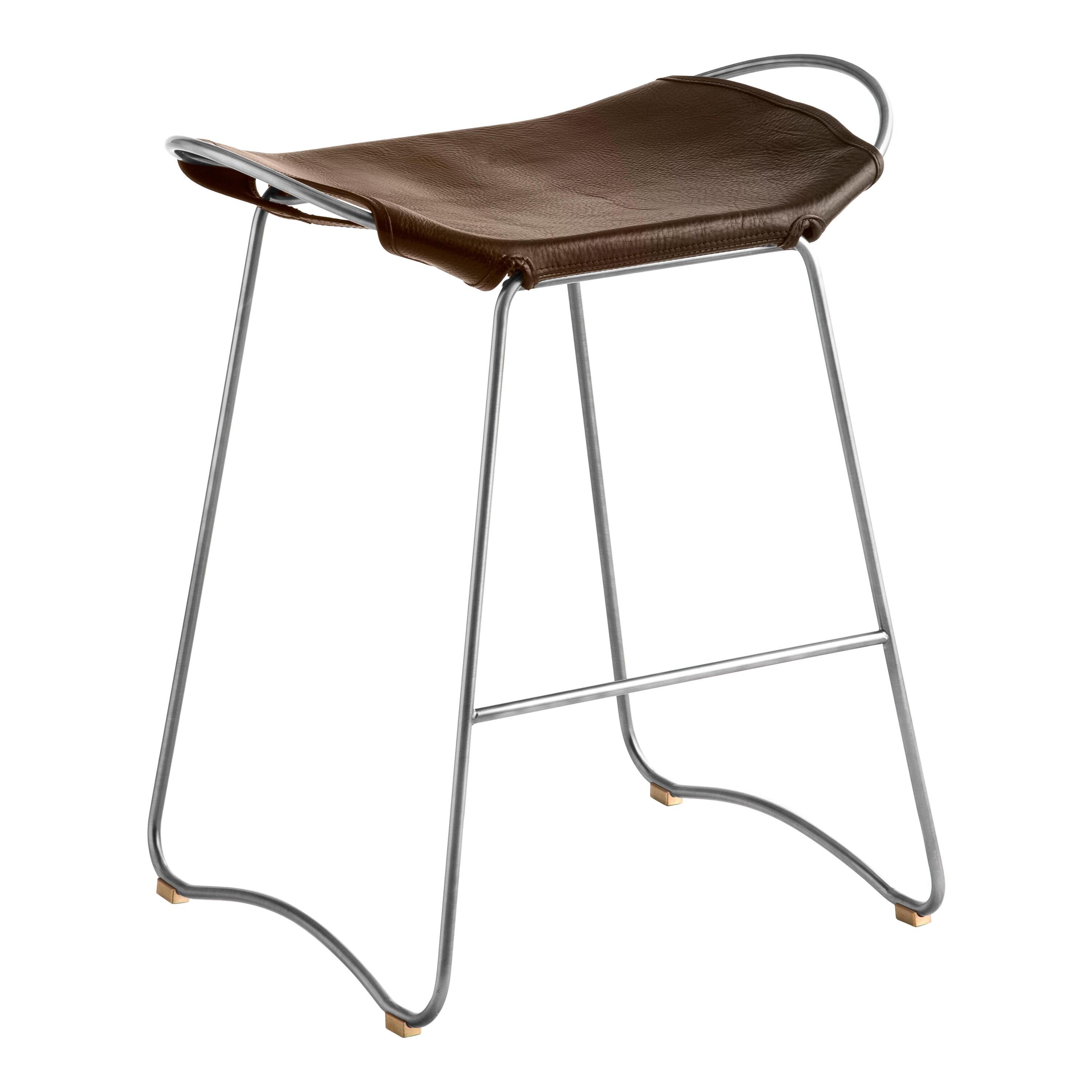 Contemporary organic bar stool, aged silver metal and dark brown leather.